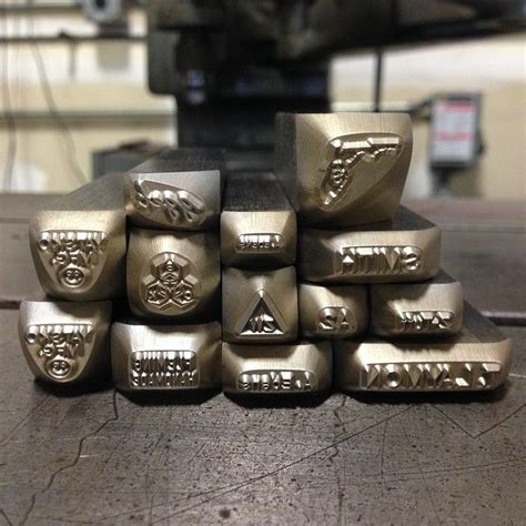 metal stamping and metal fabrication|custom made steel hand stamps.